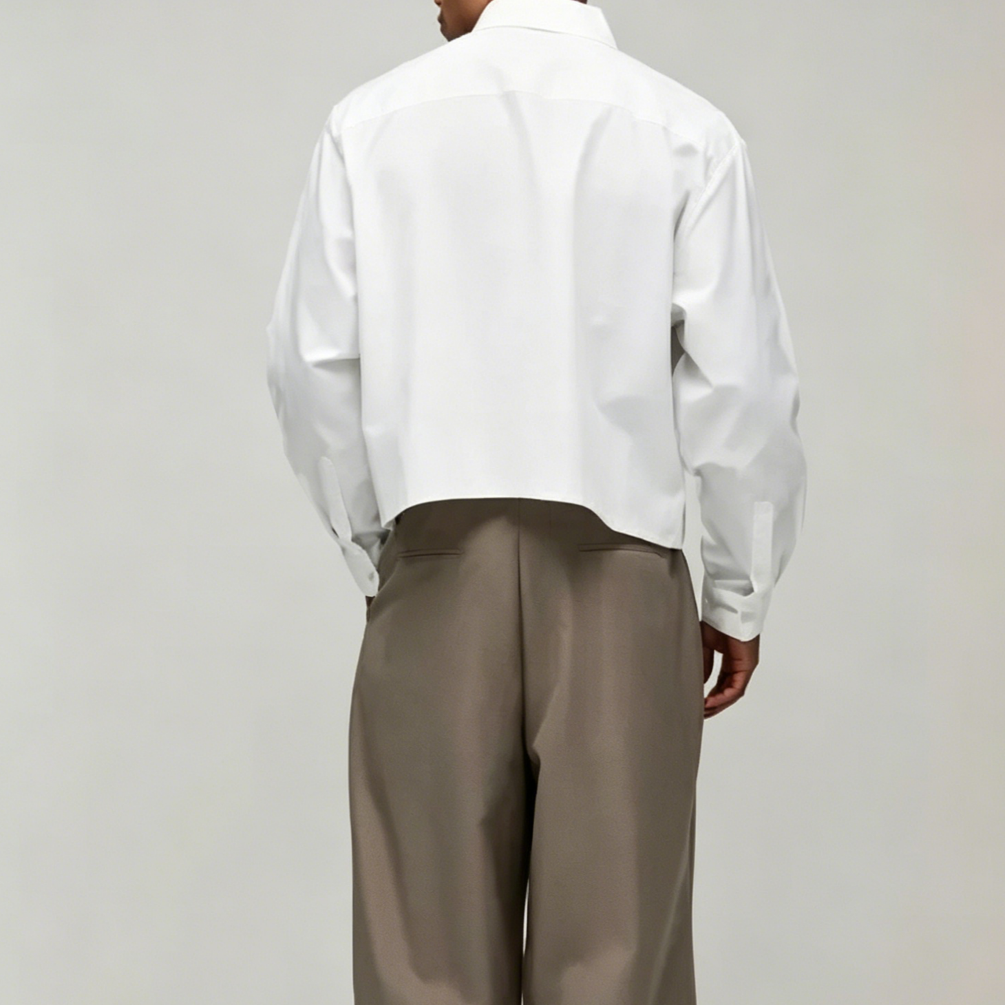 Loose fit solid white long sleeve shirt
