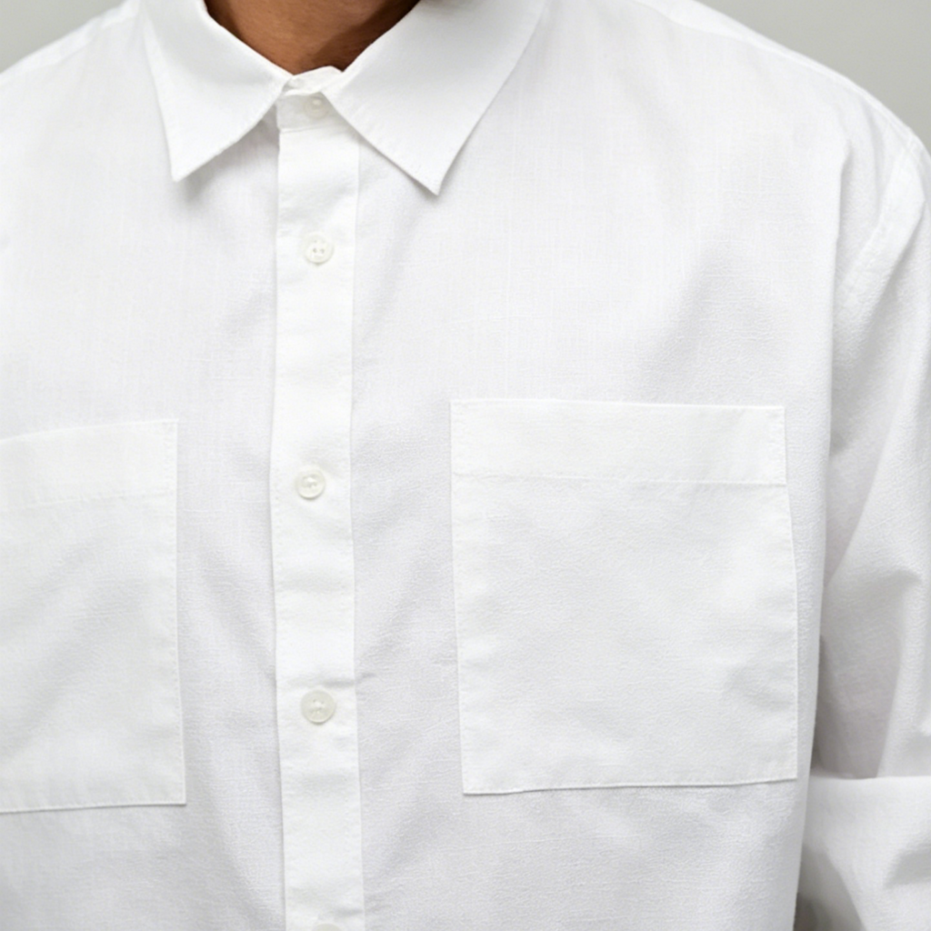 Loose fit solid white long sleeve shirt