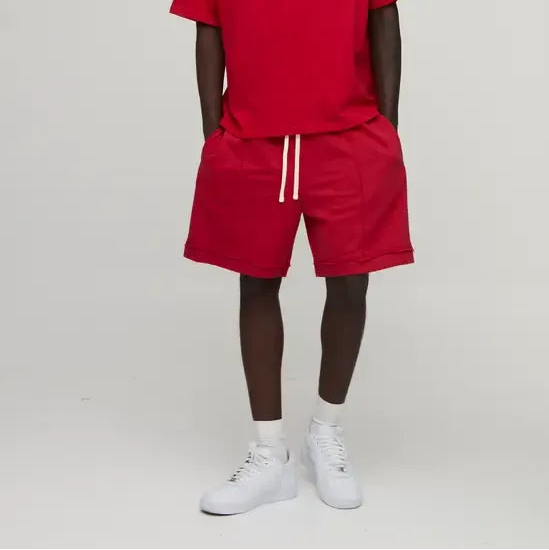 Men's red drawstring athletic shorts