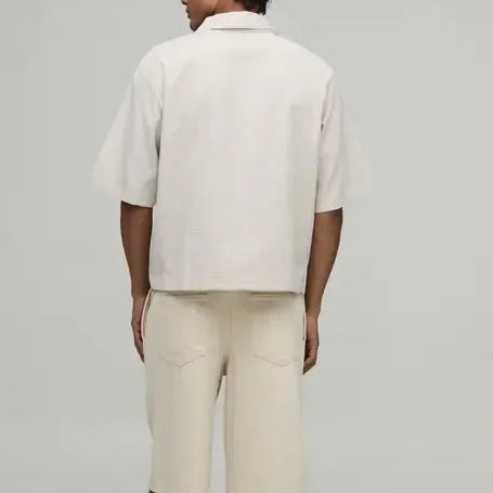 Off white short sleeve shirt
